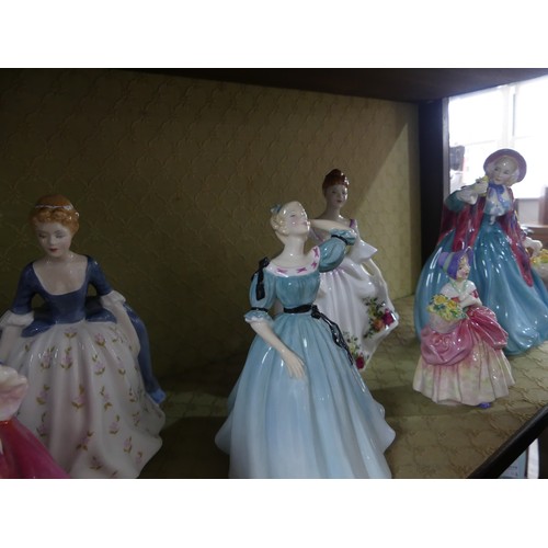 188 - A small quantity of Royal Doulton Figurines, to comprise two 'Paisley Shawl' in varied colourway, 'C... 