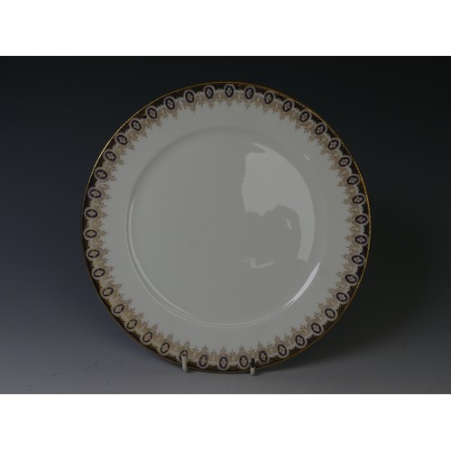 165 - A Cauldon porcelain part Dinner Service, comprising fourteen Dinner Plates, nine Soup Dishes, two sm... 