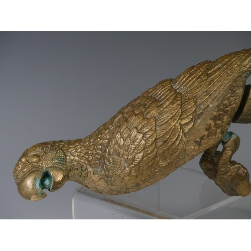 268 - A mid 20thC gilt brass sculpture of a parrot, head to tail 44 cm.