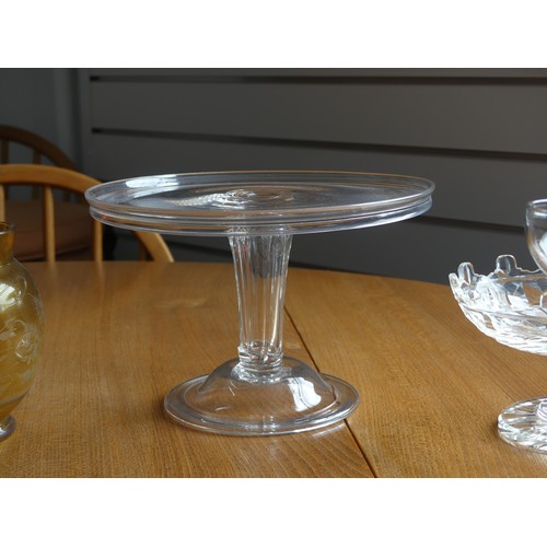 137 - An antique glass Cake Stand, with large circular base on stem, together with four other pieces of gl... 