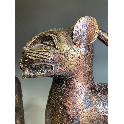 271 - A large pair of African 'Benin' Leopards, patinated resin bronze with engraved circular design, one ... 