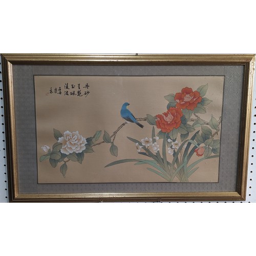 253 - A pair of Chinese paintings on silk, signed, 32cm x 56cm, mounted on a silk jacquard border, framed ... 