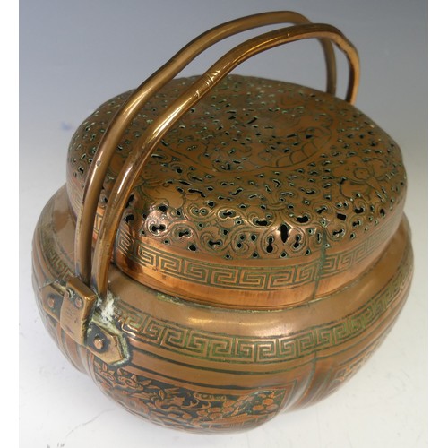 216 - A Chinese copper Hand Warmer, the body of lobed oval form with six panels of decoration depicting bu... 