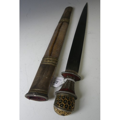 220 - A late 19thC Tibetan / Bhutanese Short Sword, the single edged steel blade with silver wirework grip... 