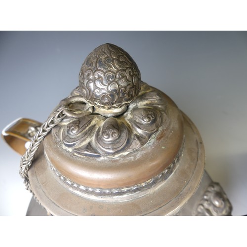 221 - A pair of 19thC Tibetan silver mounted copper ceremonial Teapots, of typical form, the removable dom... 