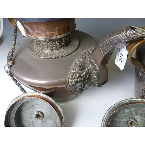 221 - A pair of 19thC Tibetan silver mounted copper ceremonial Teapots, of typical form, the removable dom... 