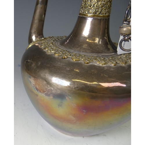 222 - A 19thC Tibetan silver and parcel-gilt ceremonial Teapot / Ewer, the plain tapering circular body wi... 