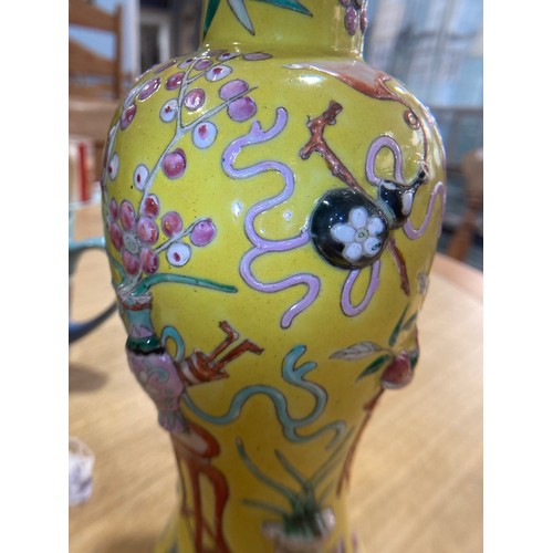 232 - A late 19thC Chinese famille jaune baluster Vase, the yellow ground with enamel decorations in relie... 