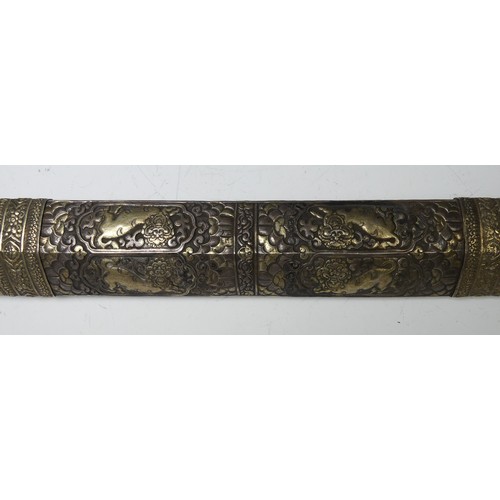 227 - A late 19thC Tibetan / Bhutanese Long Sword, the single edged steel blade with silver wire grip and ... 