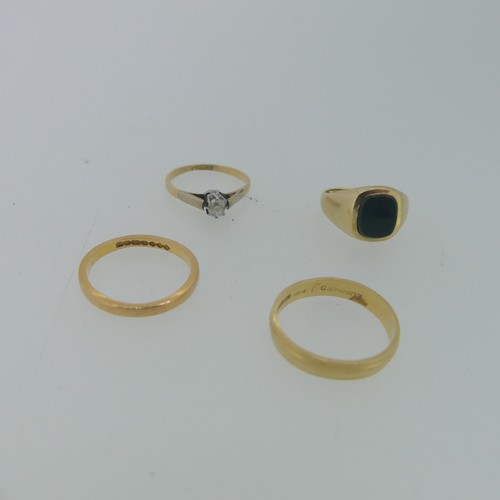 97 - A small bloodstone Signet Ring, mounted in 9ct yellow gold, Size E½, 2.2g, together with a single st... 