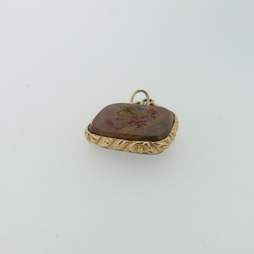 220 - An antique style hardstone intaglio Fob, possibly jasper, carved with a classical head, unmarked yel... 