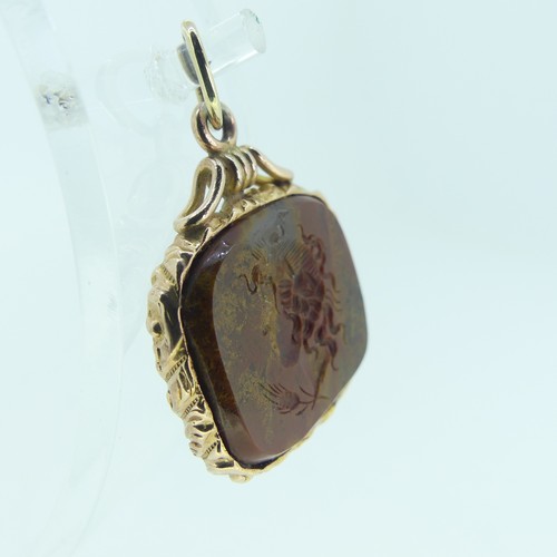 220 - An antique style hardstone intaglio Fob, possibly jasper, carved with a classical head, unmarked yel... 