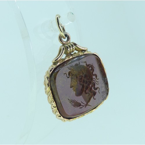 220 - An antique style hardstone intaglio Fob, possibly jasper, carved with a classical head, unmarked yel... 