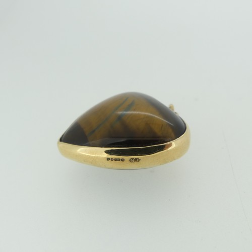 221 - A 9ct gold mounted Tiger's Eye heart shaped Pendant, hallmarked London 1977, 3cm wide.... 