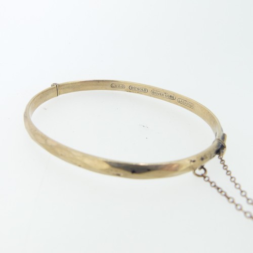 224 - An 18ct yellow gold Identity Bracelet, with inscription, 10.2g, together with a rolled gold bangle a... 