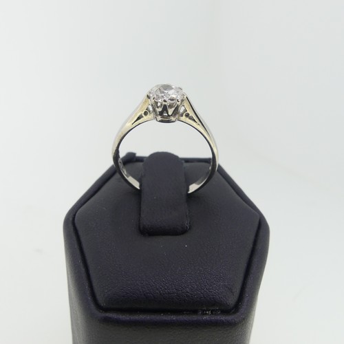 100 - A single stone diamond Ring, the cushion cut stone approx. 0.6ct, claw set in 18ct white gold, Size ... 