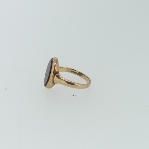 111 - A 9ct gold and carnelian seal Ring, the navette shaped front with vacant matrix, 17mm long, Size S½,... 