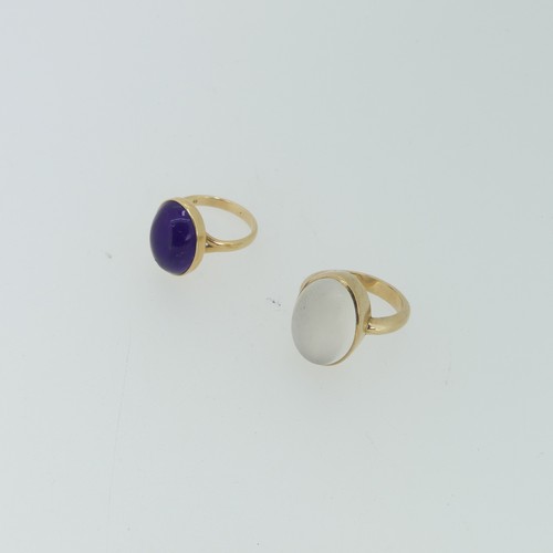 112 - A cabochon amethyst Ring, 15mm long, collet set in 14ct yellow gold, Size N, 4.8g, together with a 9... 