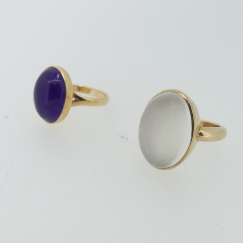 112 - A cabochon amethyst Ring, 15mm long, collet set in 14ct yellow gold, Size N, 4.8g, together with a 9... 