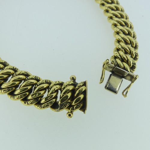 181 - An 18ct yellow gold Bracelet, with integral clasp, 10.2mm wide, 19.5cm long, 25.1g.