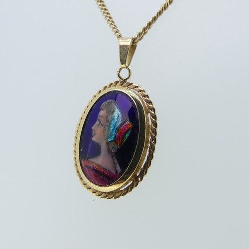 153 - An 18ct gold mounted enamel Pendant, with rope border, 25mm long exc. suspension loop, on an 18ct go... 