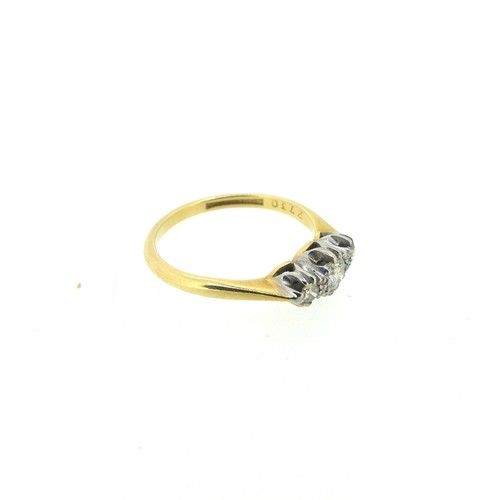 116 - A small three-stone diamond Ring, the centre stone approx. 0.17ct, mounted in 18ct yellow gold and p... 