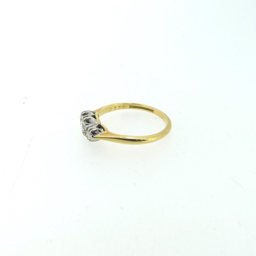 116 - A small three-stone diamond Ring, the centre stone approx. 0.17ct, mounted in 18ct yellow gold and p... 