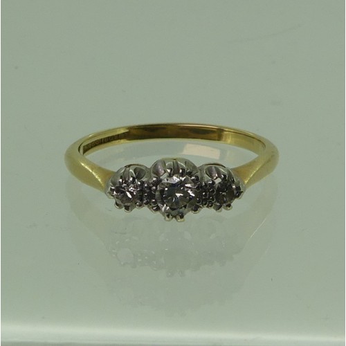 116 - A small three-stone diamond Ring, the centre stone approx. 0.17ct, mounted in 18ct yellow gold and p... 