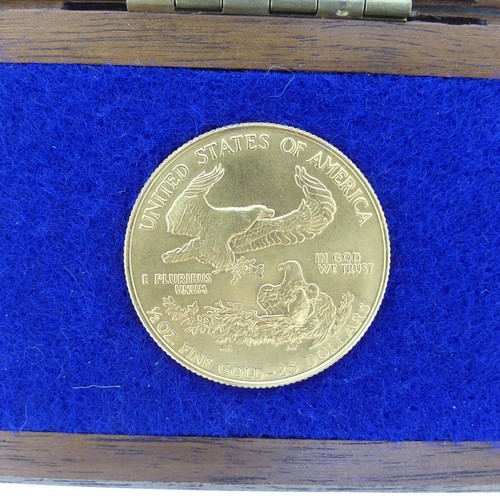 310 - A United Stated ½ oz fine gold 25 dollars Coin, dated 1986, 16.966g.