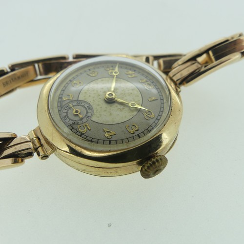 287 - A 9ct gold lady's Wristwatch, with Swiss 16-jewels movement, 25mm case diameter, on an expanding 9ct... 