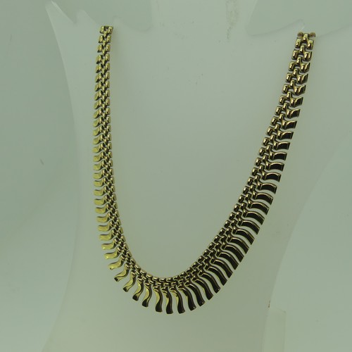 164 - A 9ct yellow gold 'Cleopatra' fringe Necklace, 41cm long, 18.g.