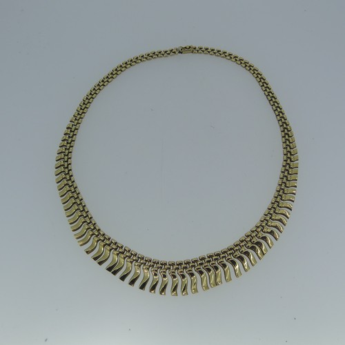 164 - A 9ct yellow gold 'Cleopatra' fringe Necklace, 41cm long, 18.g.