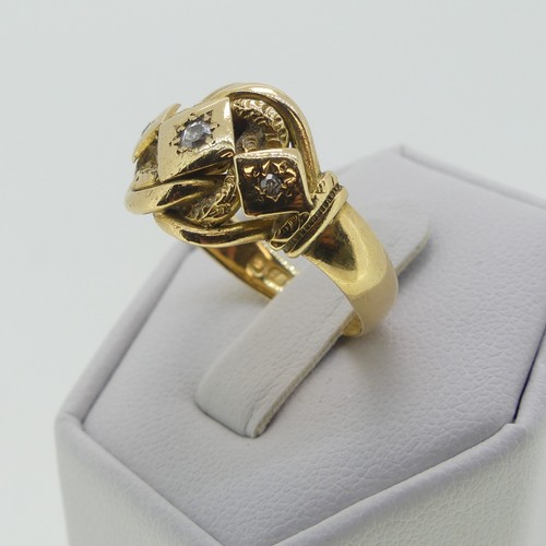 123 - An 18ct yellow gold Ring, the scrolling knot front gypsy set three diamond points, hallmarked Cheste... 