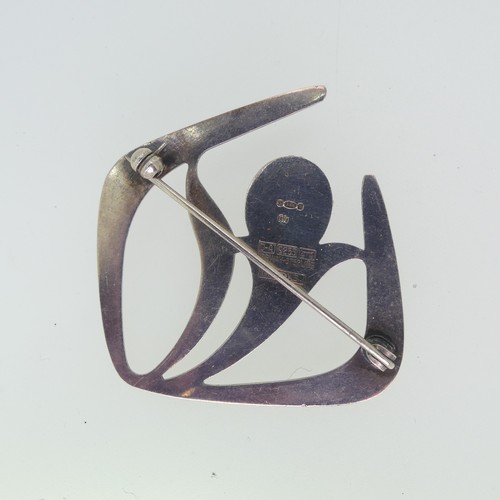 207 - David Andersen; A modernist silver 'Troll' series Brooch, designed by Harry Sorby, set with a caboch... 