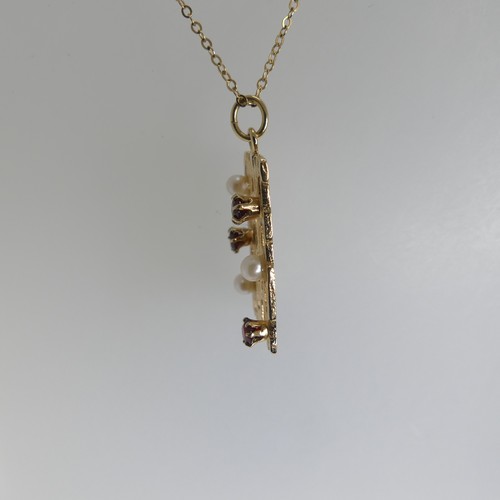 170 - A 9ct yellow gold, cultured pearl and garnet Pendant, of pierced textured rectangular form in the 19... 