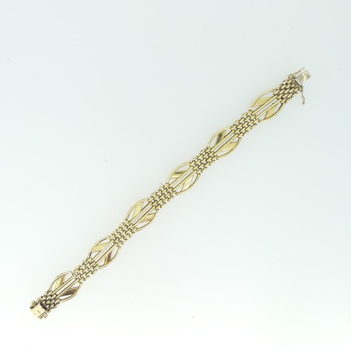 187 - A 9ct yellow gold Bracelet, formed of alternate bricklink and geometric sections, integral clasp, im... 