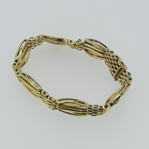 187 - A 9ct yellow gold Bracelet, formed of alternate bricklink and geometric sections, integral clasp, im... 