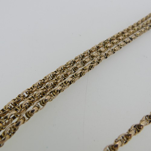 174 - A Victorian graduated triple row 10ct gold chain Necklace, with watch clip clasp marked 10c and one ... 