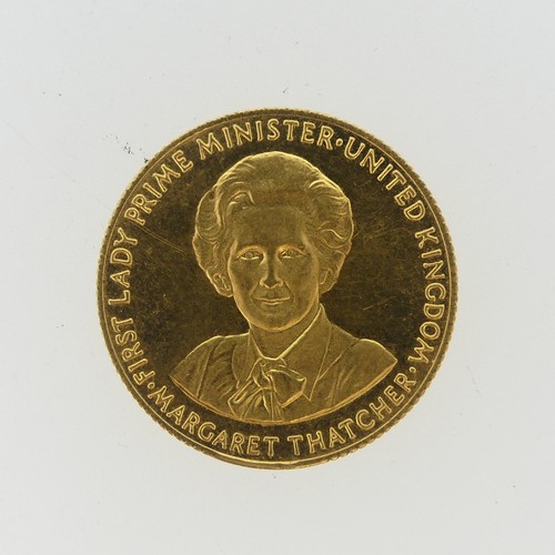 321 - A 9ct gold Margaret Thatcher 'Britain's First Lady Prime Minister' commemorative Coin Token, dated 1... 