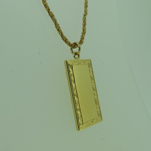 175 - An 18ct yellow gold Ingot style Pendant, the vacant centre with foliate engraved border, 35mm long, ... 