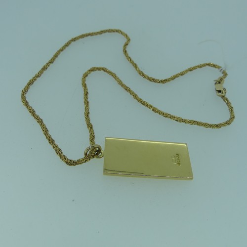 175 - An 18ct yellow gold Ingot style Pendant, the vacant centre with foliate engraved border, 35mm long, ... 