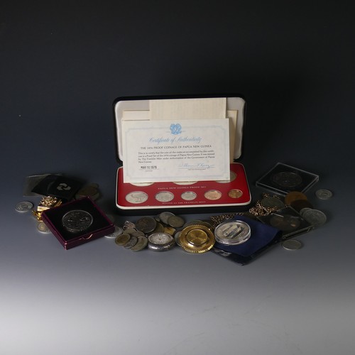 325 - A 1976 Papua New Guinea Proof Coin Set, issued by The Franklin Mint, with certificate, together with... 