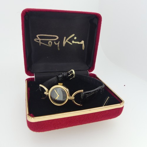 294 - A 9ct yellow gold Roy King lady's Wristwatch, hallmarked London, 1976, the signed plain black dial w... 