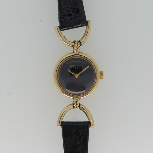 294 - A 9ct yellow gold Roy King lady's Wristwatch, hallmarked London, 1976, the signed plain black dial w... 