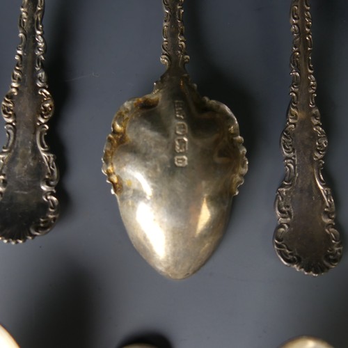 65 - A set of Eleven Edwardian silver Teaspoons, by Duncan & Scobbie, hallmarked Sheffield, 1905, wit... 