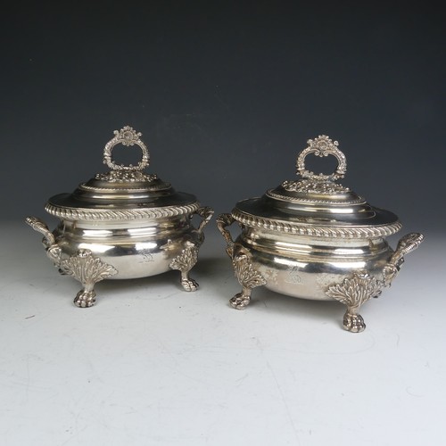 68 - A pair of early 19thC Old Sheffield Plate Sauce Tureens, of oval form with shell capped handle and p... 