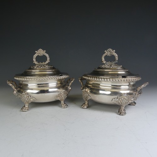 68 - A pair of early 19thC Old Sheffield Plate Sauce Tureens, of oval form with shell capped handle and p... 