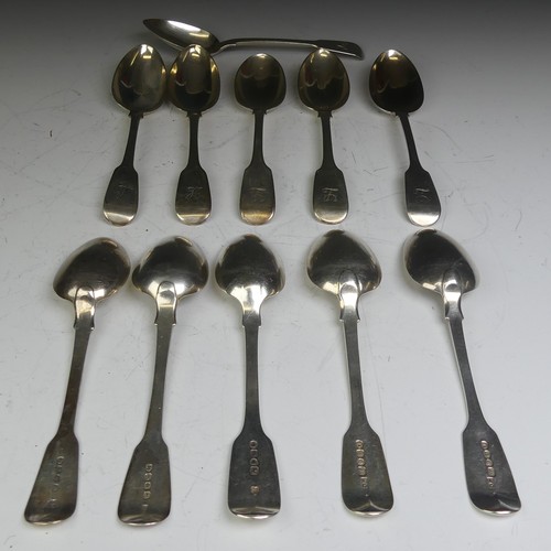 73 - A harlequin set of eleven 19thC silver fiddle pattern Dessert Spoons, three William Chawner II Londo... 