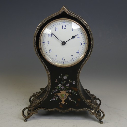 An Edwardian silver and tortoiseshell balloon Mantle Clock, hallmarked William Comyns, London 1907, the unsigned white enamel dial with blue Arabic numerals, the front with Neoclassical foliate decoration inlaid with gold and abalone shell, all raised on scrolling silver supports, 20cm high, not running, the tortoiseshell with two areas of damage, one on the front at the '8' hour marker, the other on one corner at the top.