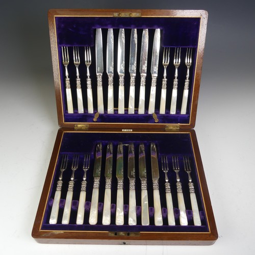 85 - An early 20thC cased set of twelve Dessert Knives and Forks, by Allen & Daws, Norwich, the silve... 